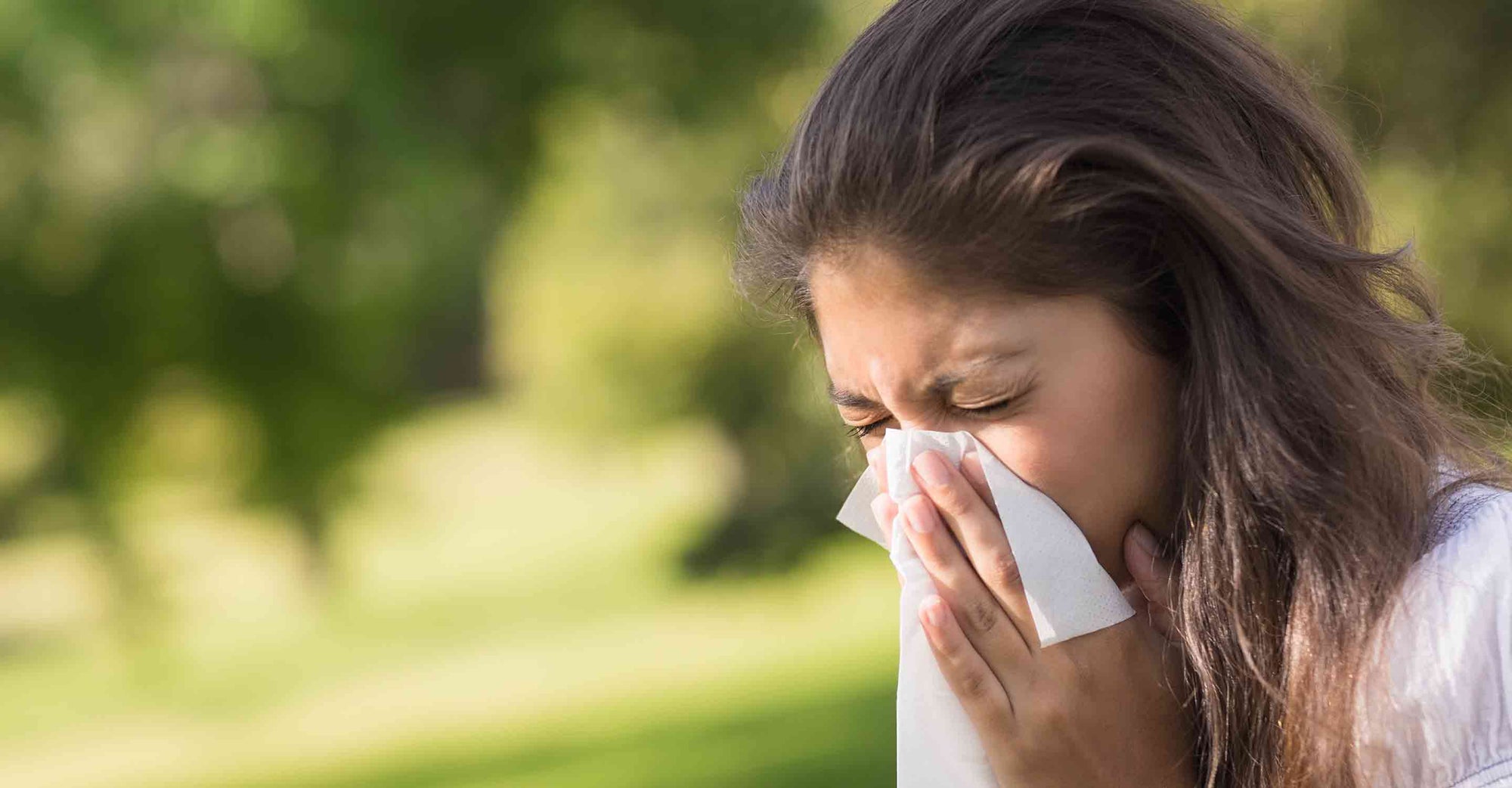 Woman seen blowing her nose