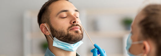 man receiving nasal swab