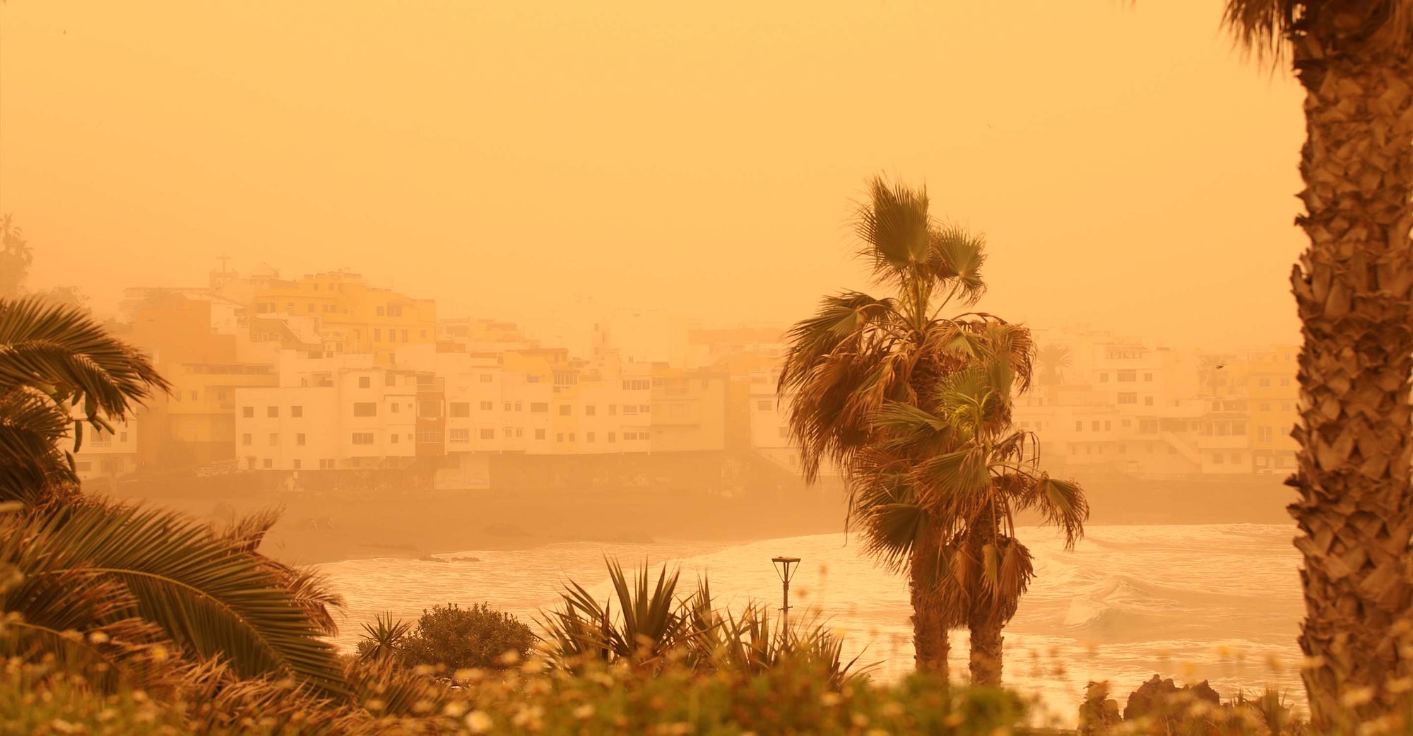 Dust storms are discoloring the skies in Spain.