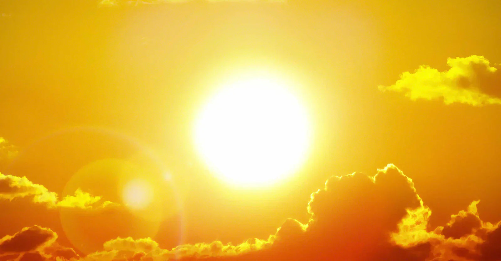blazing sun in sky