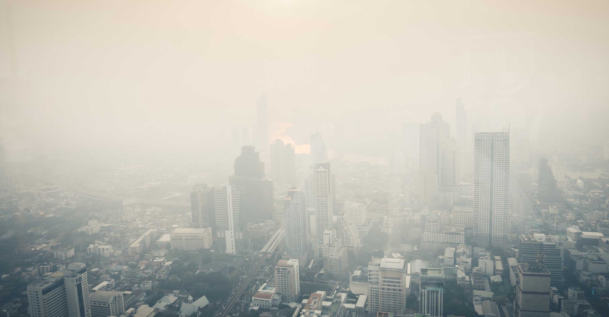 smog coming out of factory exhaust pipes