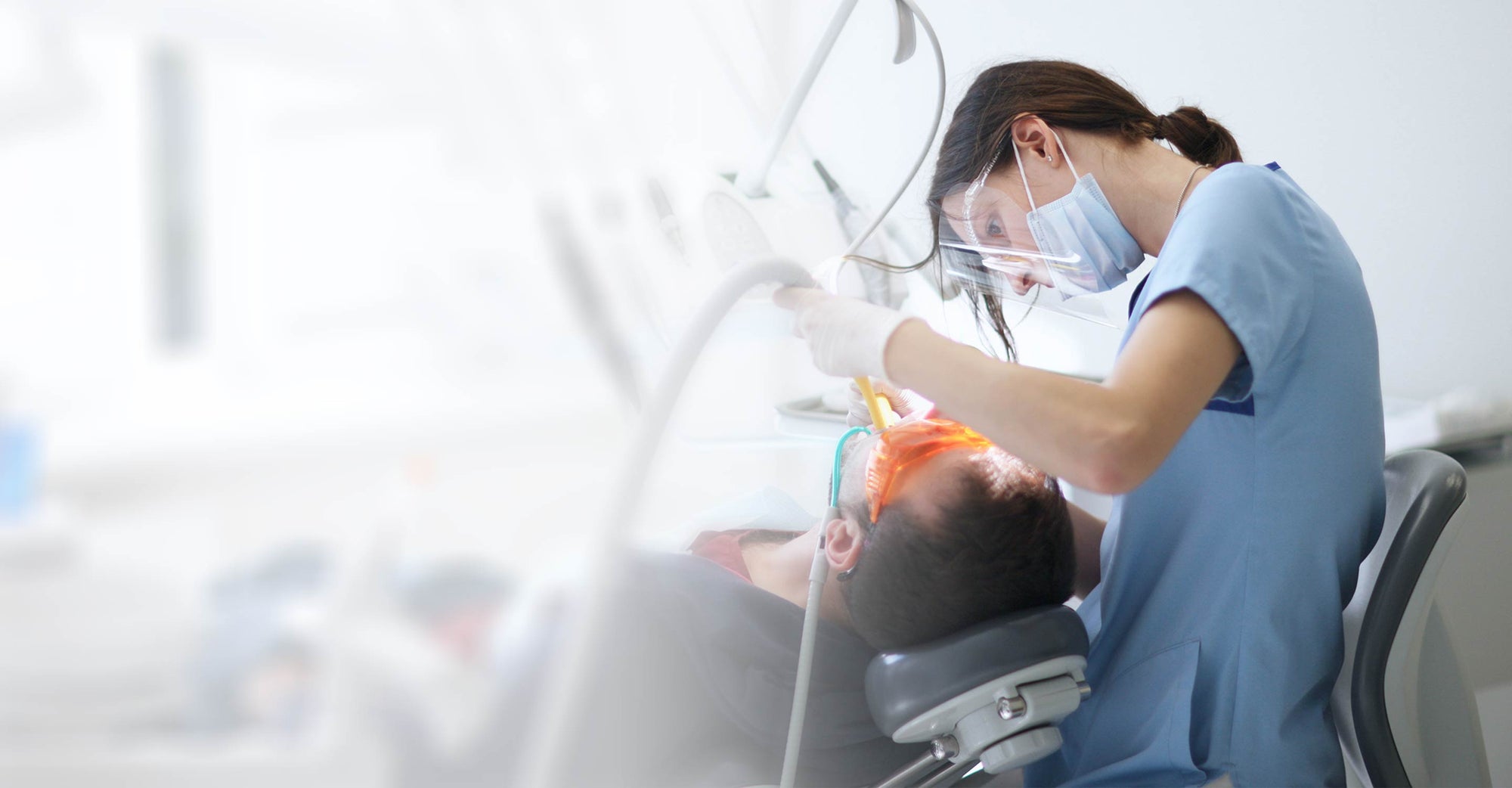 Dentist working on patient