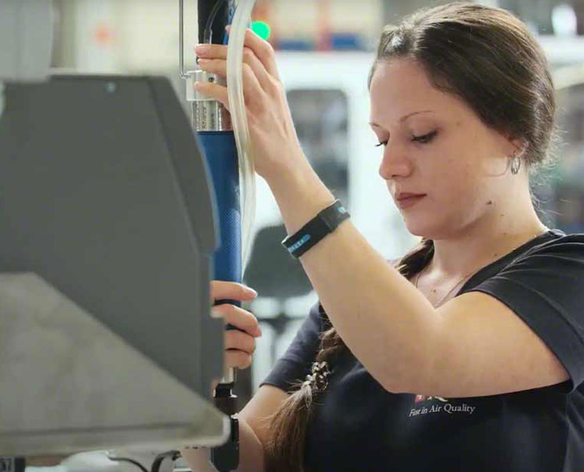 IQAir technician carefully manufacturing a powerful air purifier